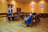 Przedsiębiorcy słuchający prezentacji