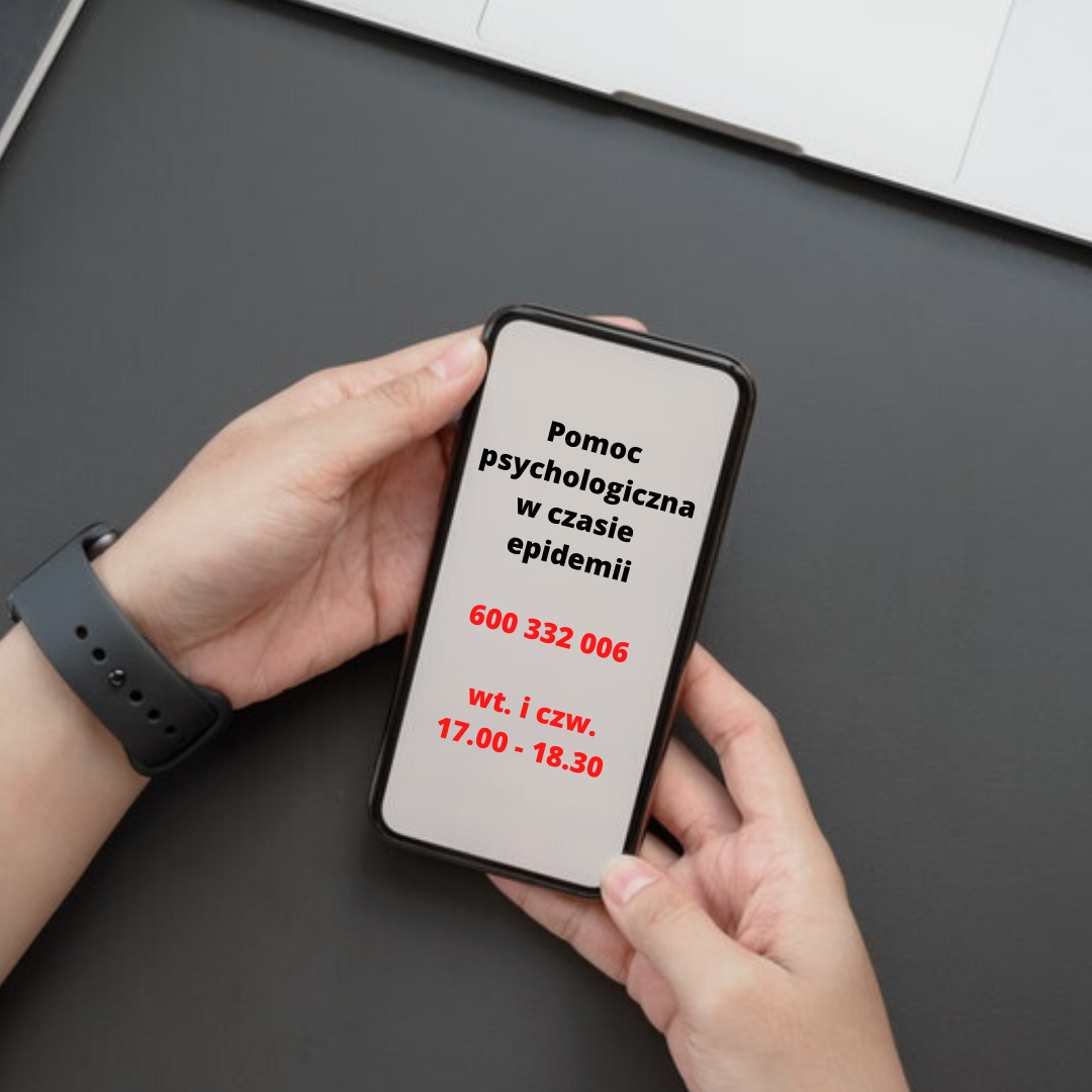 Zdjęcie telefonu trzymanego w dłoniach z numerem telefonu porad psychologicznych: 600 332 006